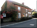 Post Box and Family Butchers Shop in The Street