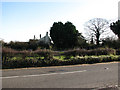 Looking east across the B1110 (Dereham Road)