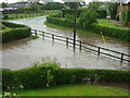 SJ5873 : Small Brook at Ruloe in flood by Steve Burrows