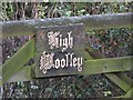 Ornate lettering on the gate sign for High Woolley