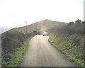 View south into the eye of the sun along the mountain road