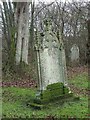 NY8355 : Mossy grave headstone in St Cuthbert's churchyard by Mike Quinn
