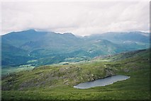 SH6447 : Llyn y Biswail from Cnicht summit ridge by Peter S