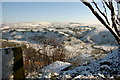 Hartshead Pike with River Medlock in foreground