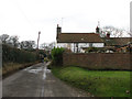 Southwest past houses on Marshgate