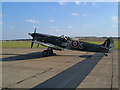 TL4646 : A Spitfire at Duxford Airfield. by Clive Warneford