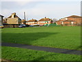 View across the green to St John