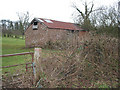 Red sandstone barn