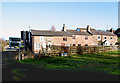 Row of red sandstone cottages