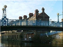 TQ2482 : Wedlake Street footbridge by Phillip Perry