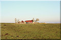 Collapsed cottage amidst  rich farmland