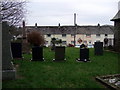 Churchyard and houses at New Moat