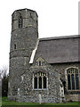 TL9997 : St Peter's church - tower and south porch by Evelyn Simak