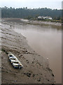 Houses in England, a boat in Wales