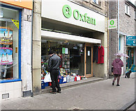NT4936 : The Oxfam shop in Galashiels by Walter Baxter