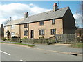 TL1183 : Cottages in Main Street, Great Gidding by Michael Trolove