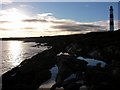 NH9487 : Tarbat Ness Lighthouse in wintery sun by IainMac