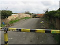 Closed off road over dismantled railway line