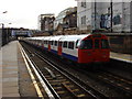 TQ2583 : London Underground train at Kilburn High Road station by Oxyman