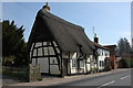 Half-timbered thatched cottage