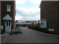 View between houses in Grange Road through to The Petersfield School