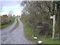 Public footpath along farm approach road