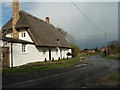 TL1379 : Thatched Cottage,  Hamerton by Michael Trolove