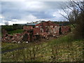 This pile of rubble is the remains of two houses.