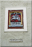 NT6420 : Plaque above the Newgate arch by Walter Baxter