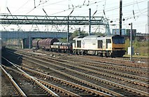 SE5703 : Northbound steel train at Doncaster by roger geach
