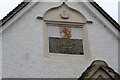 Plaque over the door of the Old Hospital