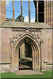 NT5434 : The south transept doorway at Melrose Abbey by Walter Baxter