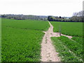 TR0954 : Footpath crossroads in the middle of a field by Nick Smith