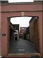 Archway through to courtyard of 19 East Street