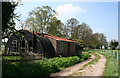 Derelict building by farm track: close up