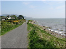 J0908 : Road by shore at Bellurgan Point by Kieran Campbell