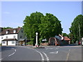 War Memorial and old Well House