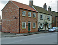 A house and a pub in Church Street, Kilham