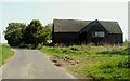 TL8809 : A barn at Little London Farm on Wash Lane by Robert Edwards