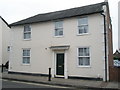 Cream coloured house near Tower Street