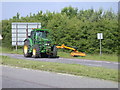 Cutting the verges on Barton Road