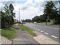 Car turning out of Flansham Park onto the A259