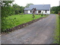 G7877 : Residence along the N56 road west of Knocknahorna by C Michael Hogan