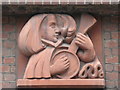 Carved stone above entrance to Rupert House, Nevern Square, SW5