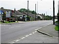 Looking S along the A260 at Densole