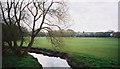 View from footbridge over River Sowe towards Ernesford Grange School