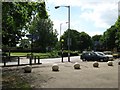 Citi 1 bus and parking area outside Campkin Road shops