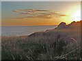 SJ2383 : Clifftop sunset by Dennis Turner