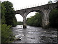 NN5732 : Old Railway Bridge over the River Dochart by Iain Lees