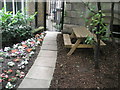 Picnic area within churchyard of St Olave Jewry